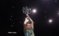 Holger Rune celebrates with the winner's trophy after defeating Novak Djokovic in the final at the Rolex Paris Masters
